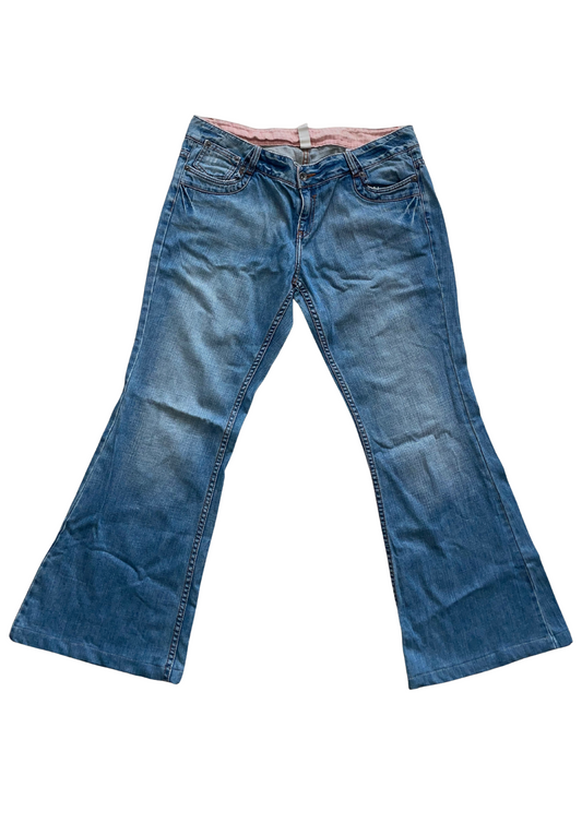 low waisted jeans with graphic on the back