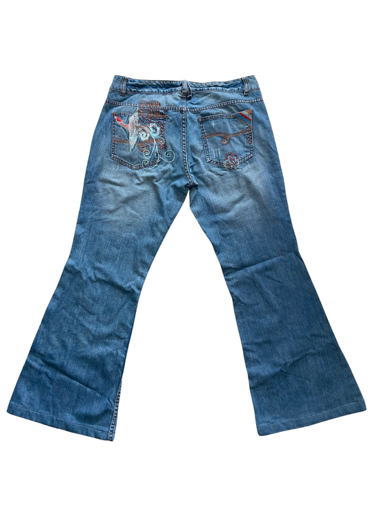 low waisted jeans with graphic on the back